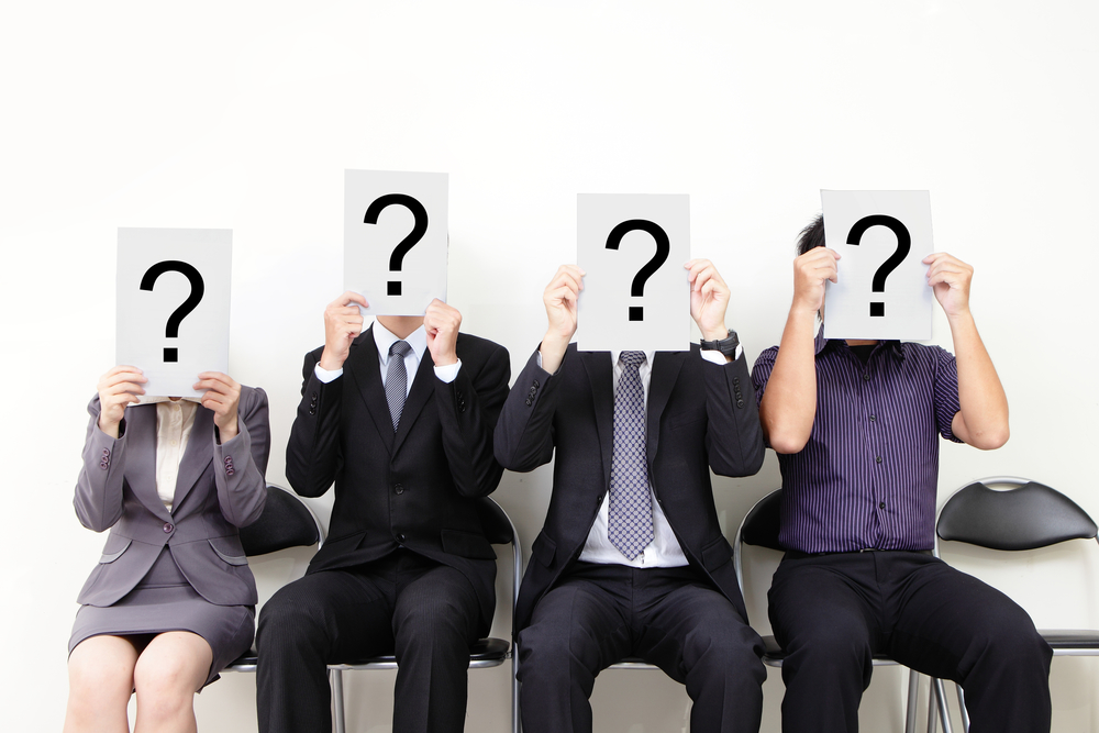 Human resource concept, Young businessman holding white billboard with a question mark on it and waiting for job interview, , asian people