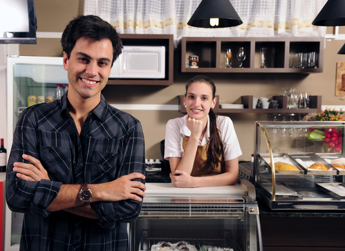 small business portrait: owner of a cafe and waitress