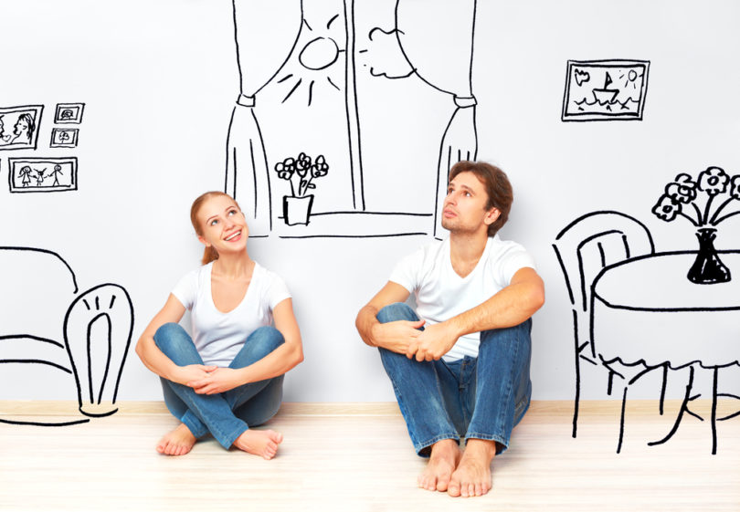 Concept : happy couple in  new apartment dream and plan interior