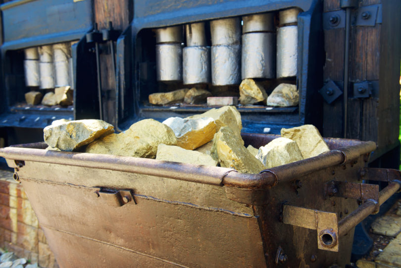 Trolley with gold ore in the gold mine in museum