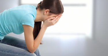 depression teen girl cried lonely in room