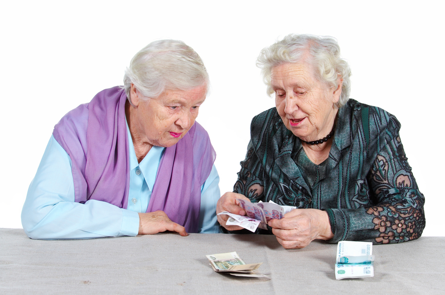 Two Grandma is counting Russian money. Isolated. Senior people series.